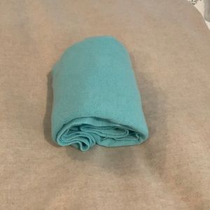 White +Warren cashmere travel wrap. Aqua color.